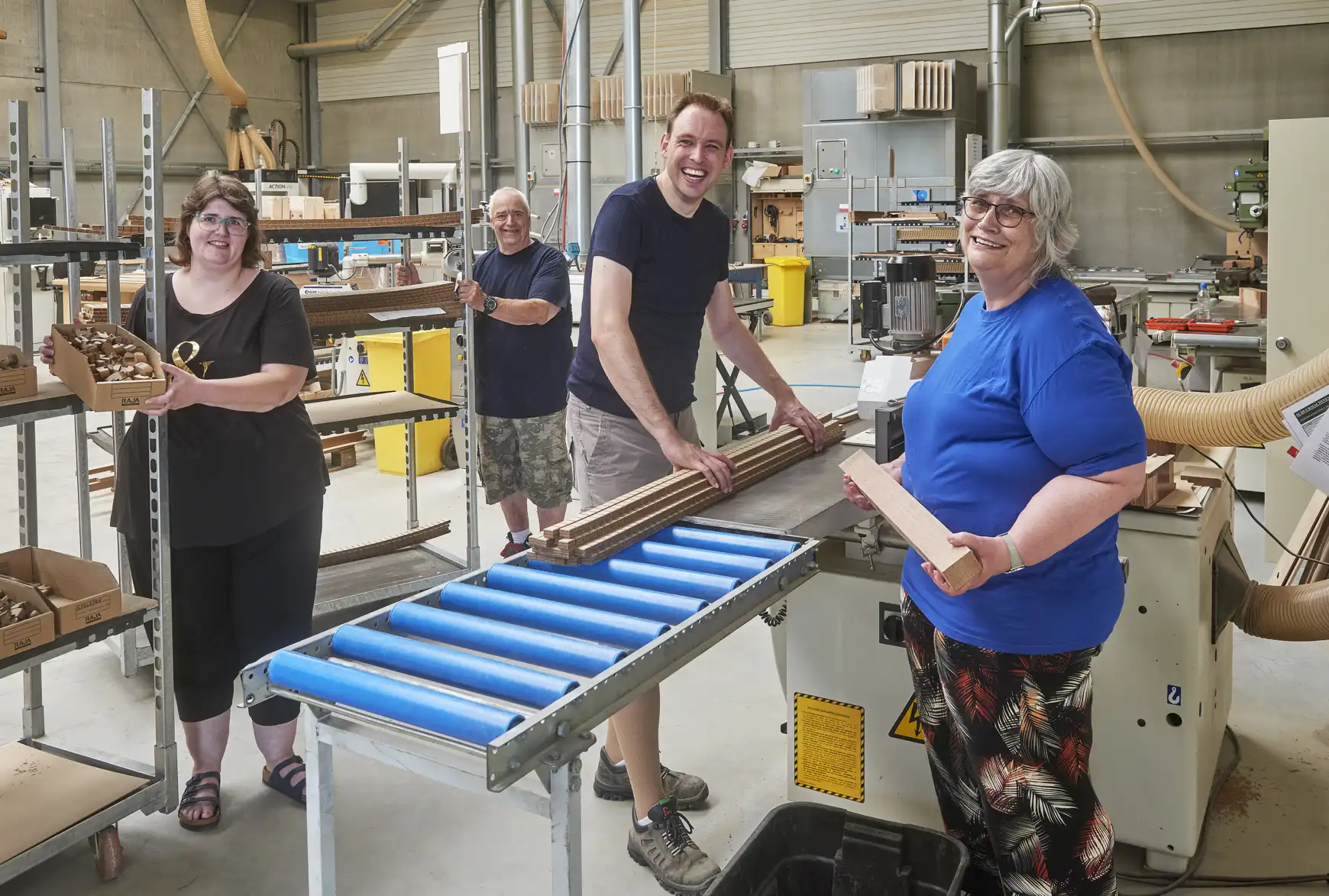 De medewerkers op de werkplek