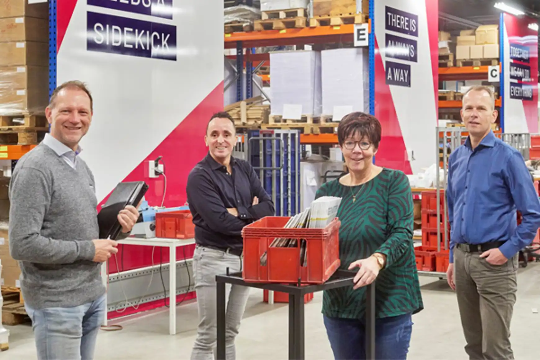 Op de foto staan van links naar rechts: Marc de Vries van Buro voor Fysieke Arbeid, Marcel van Ras van IBN, Marjo Rutten en Pierre Schreuder, HR manager bij Sidekix.