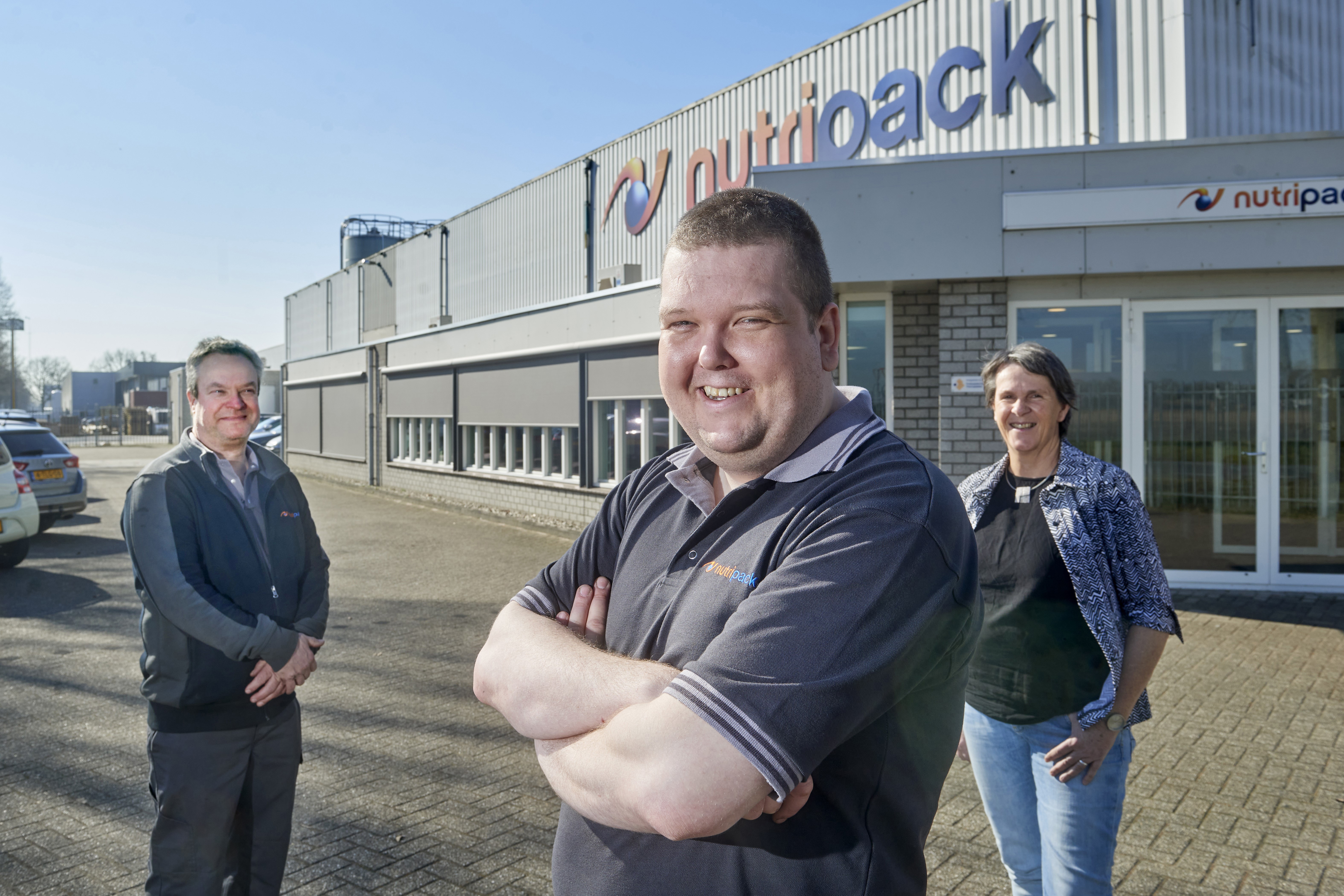 Richard met collega's voor het bedrijf