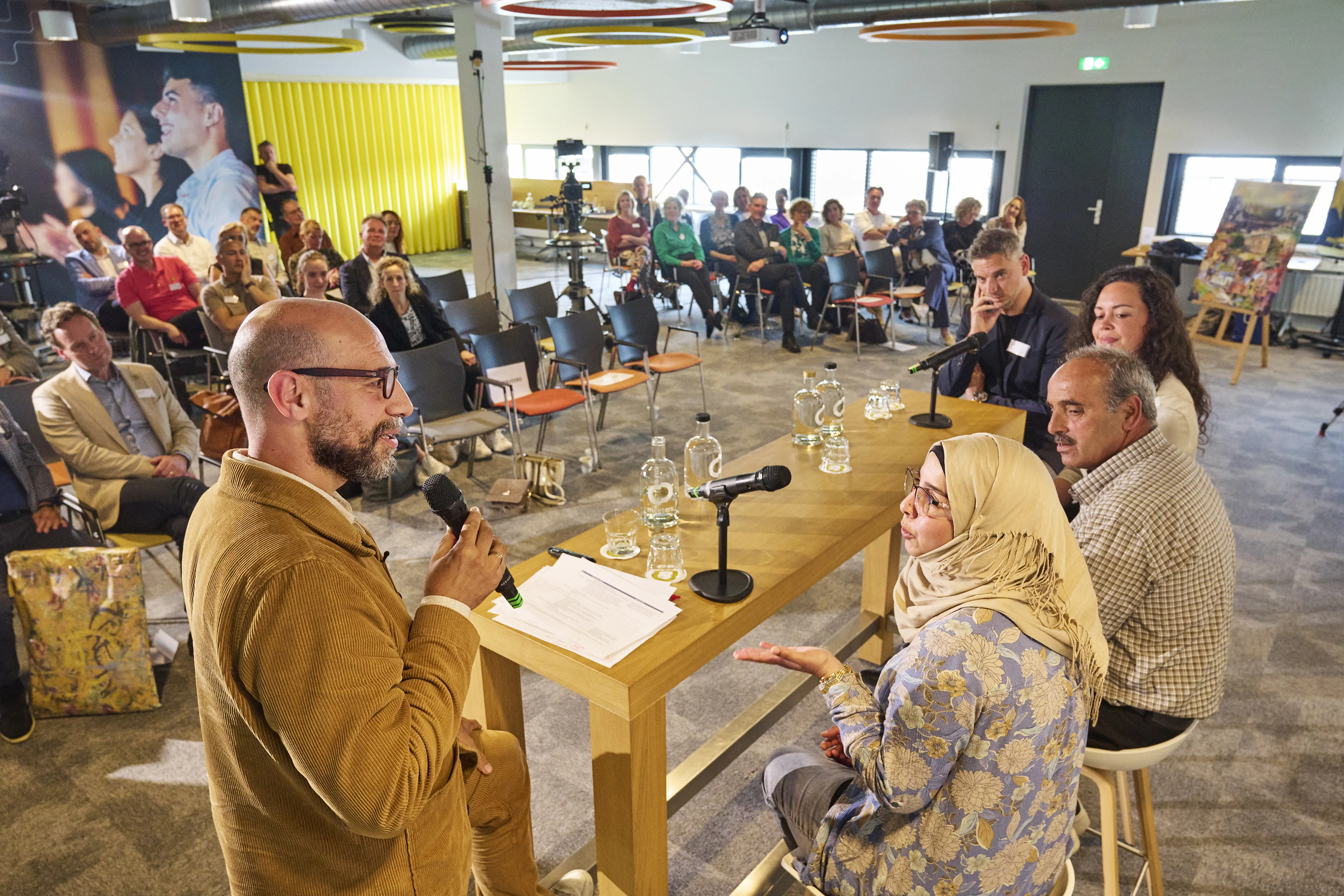 Abdelkader aan het woord tijden de bijeenkomst